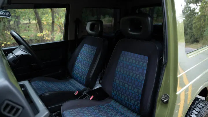 Suzuki Jimny front seats with blue patterned upholstery